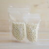 Produktbild 1 Knusprige weiße Perlen Opalys von Valrhona Ø 8mm