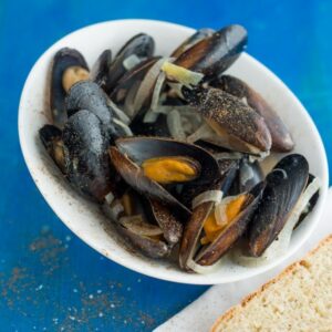 Muscheln mit Kokoscreme und Kurkuma