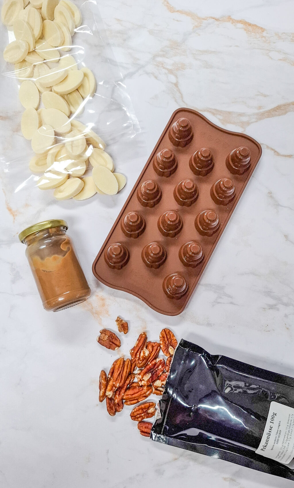 Schneemann-Pralinen mit Pekannüssen Rezept