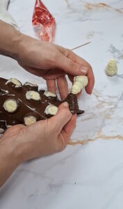 Schneemann-Pralinen mit Pekannüssen Schneemann Pralinen Rezept 1 177x300